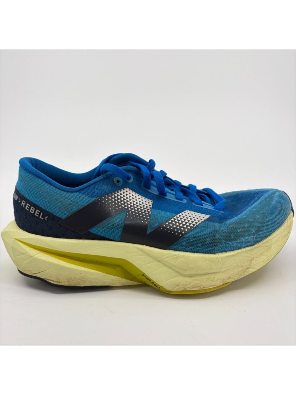 New Balance FuelCell Rebel v4 Womoens Size 6.5 Blue Black Running Shoes Sneakers